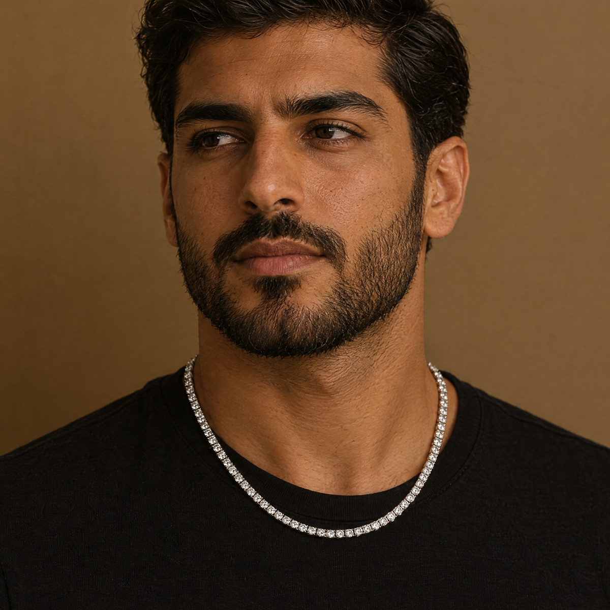 Men's 4MM Moissanite Tennis Necklace in silver worn by an Arab male model