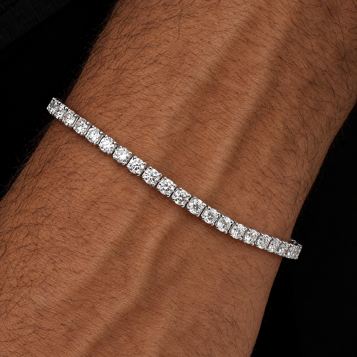 Men's Signature 3MM Tennis Bracelet in silver worn by an Arab male model