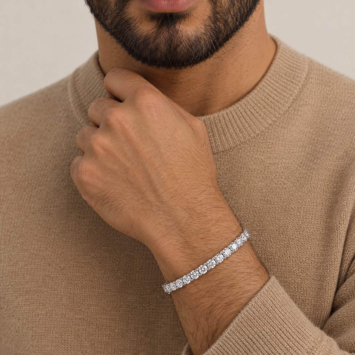 Men's 4MM Moissanite Tennis Bracelet in silver worn by an Arab male model