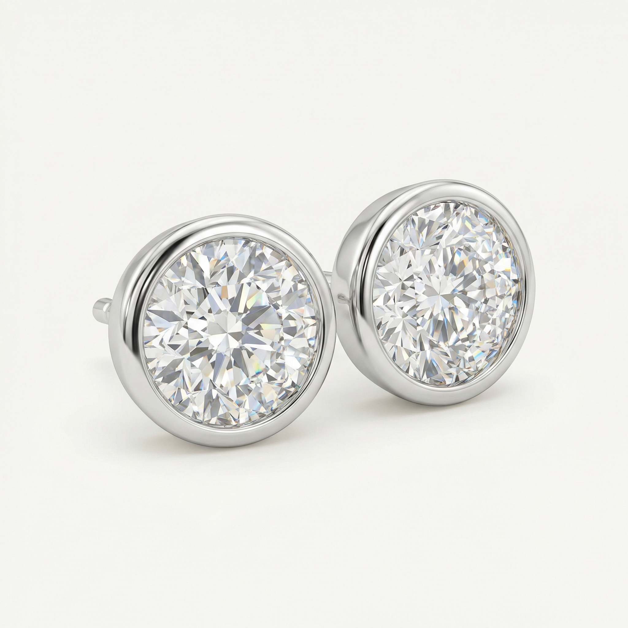 1CT BRILLIANT CUT BEZEL EARRINGS- WHITE GOLD