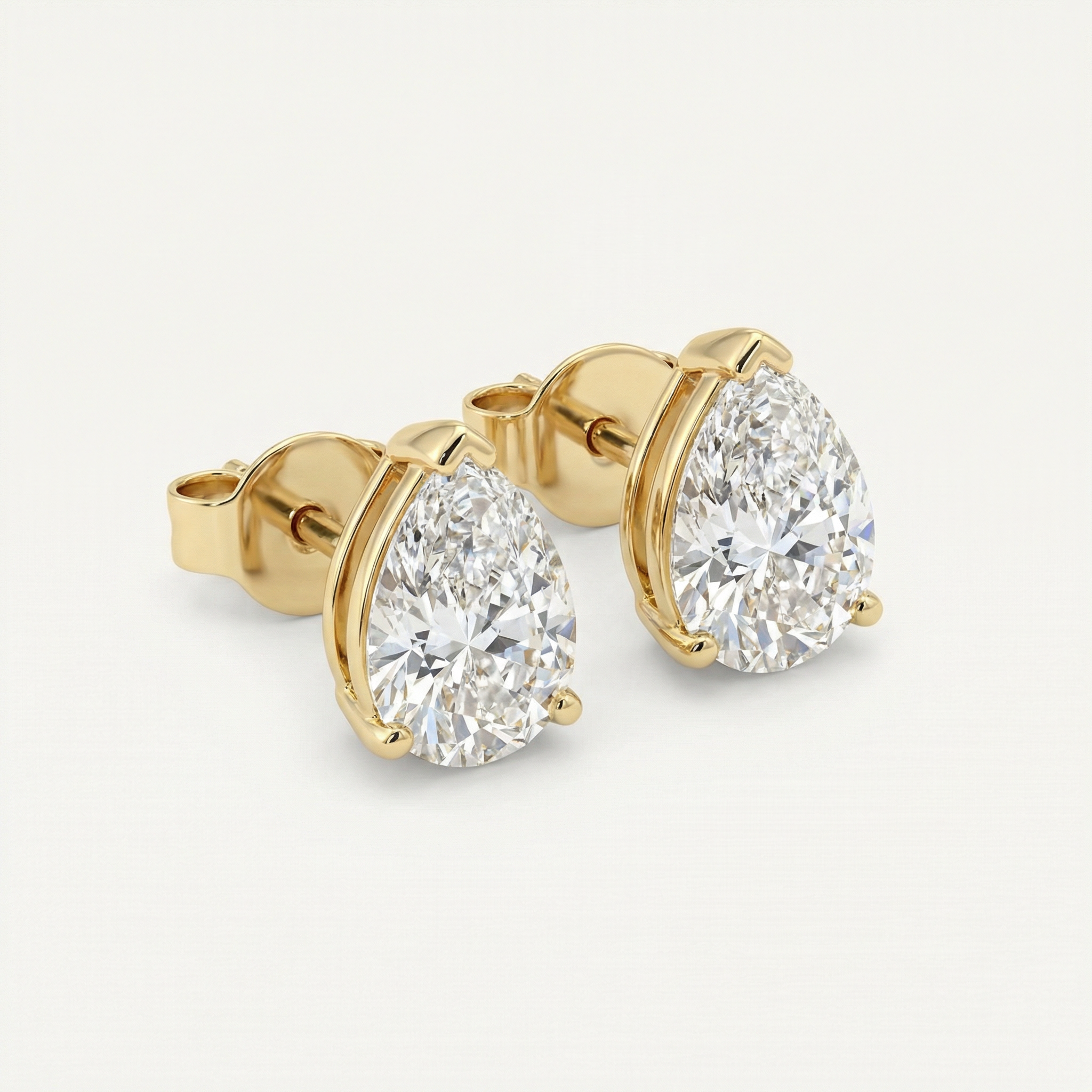 1CT PEAR STUD EARRINGS - GOLD