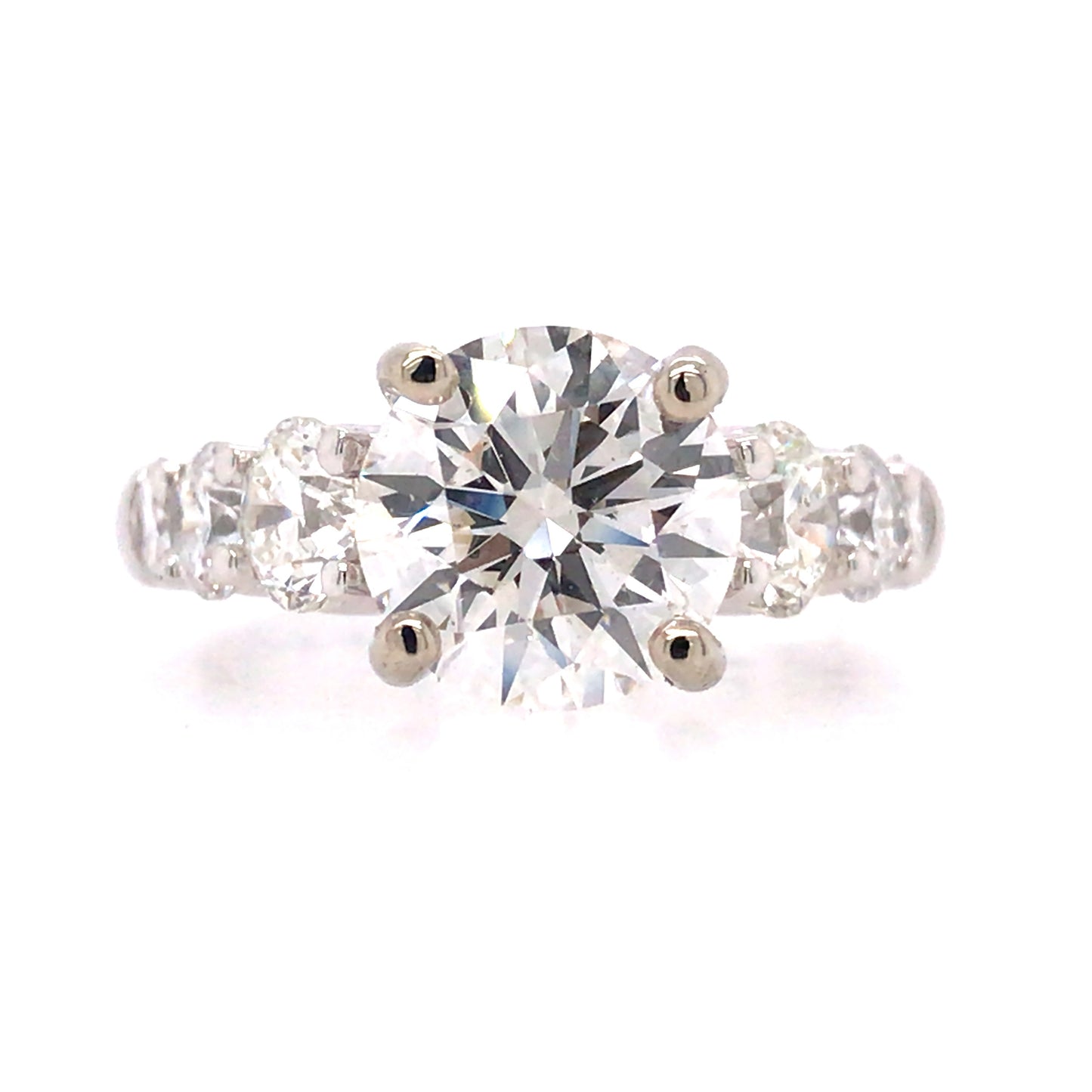 SOLITAIRE ENGAGEMENT RING WITH SIDE BRILLIANTS