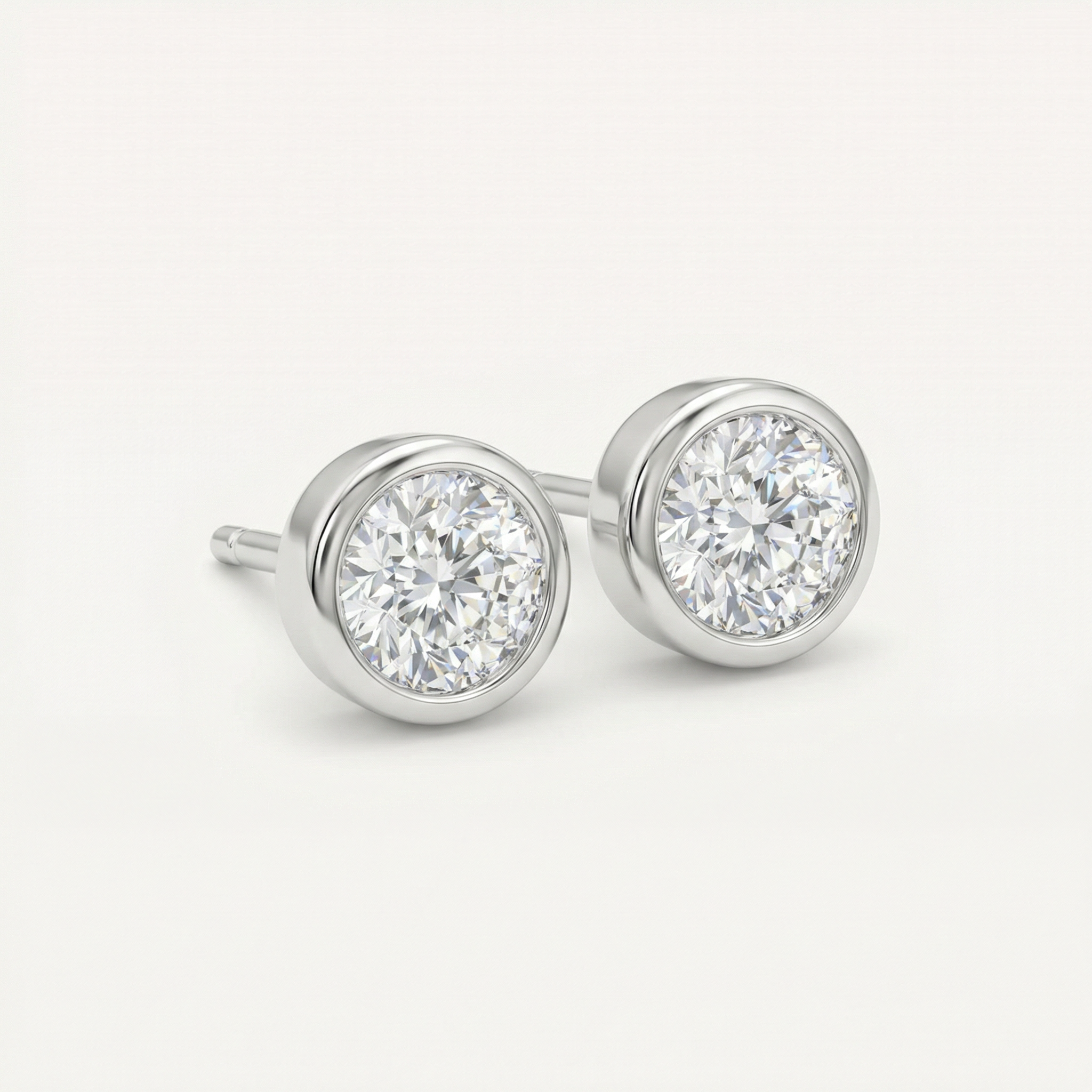 BRILLIANT CUT 0.25 BEZEL SOLITAIRE STUD EARRING