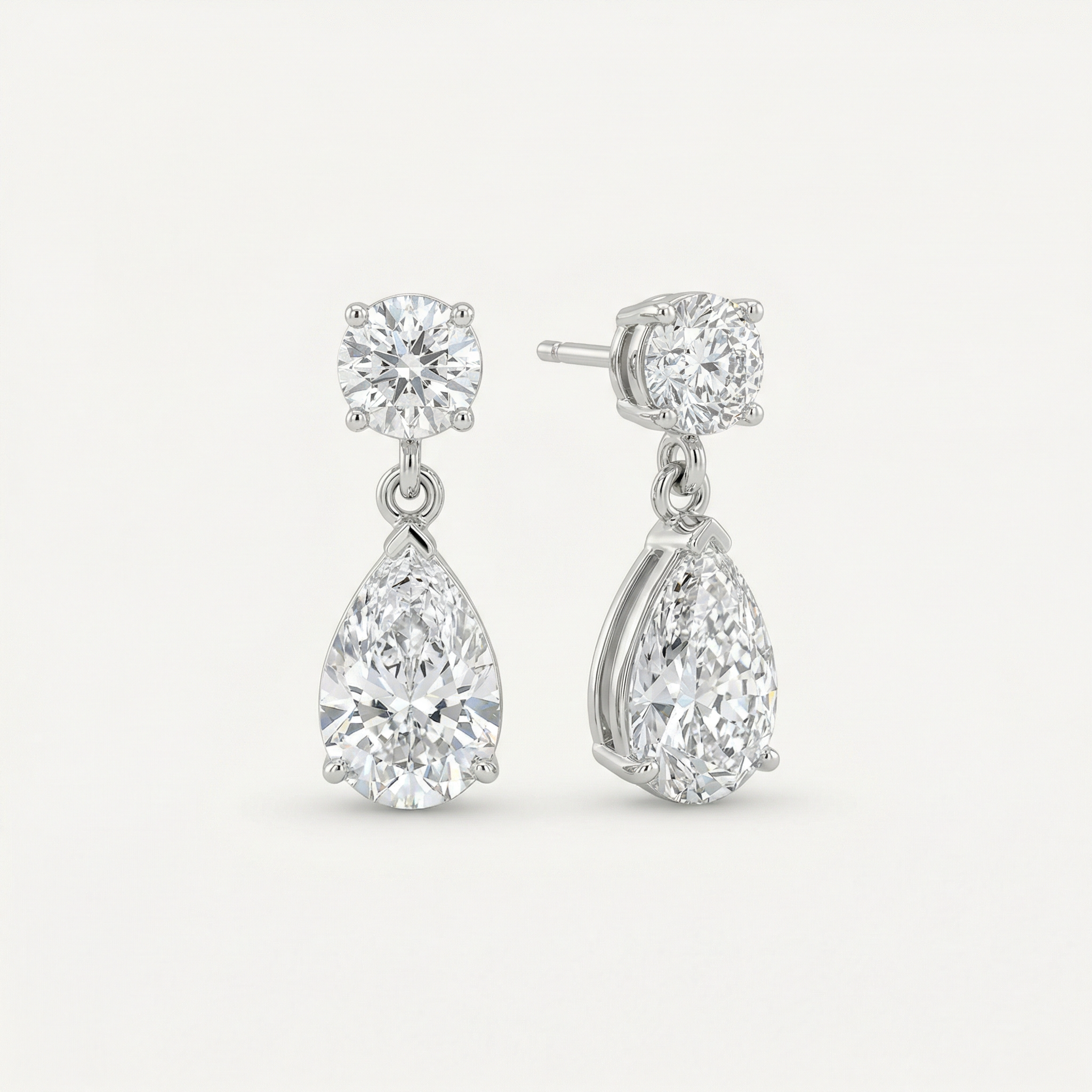 CLASSIC ROUND BRILLIANT AND TEAR DROP EARRINGS