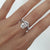 CLASSIC 2CT OVAL CUT SOLITAIRE WITH MATCHING HALF ETERNITY V-SHAPE RING