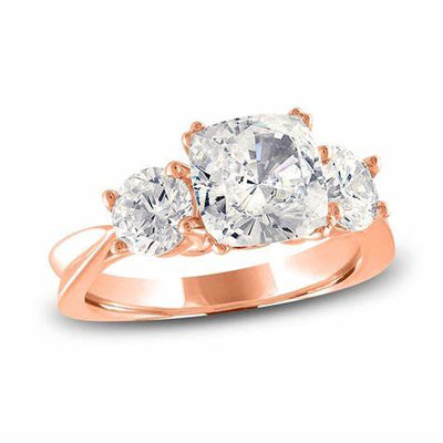 CUSHION & ROUND THREE DIAMOND RING