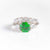 EMERALD CUSHION CUT ENGAGEMENT RING WITH SIDE DIAMONDS AND FIVE STONE CURVED BAND