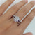 ICONIC SOLITAIRE ENGAGEMENT RING & HALF ETERNITY V-SHAPE RING