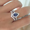 SAPPHIRE HALO TEARDROP RING WITH MATCHING V-SHAPED BAND
