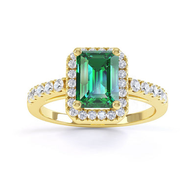 EMERALD CUT & COLOURED HALO RING