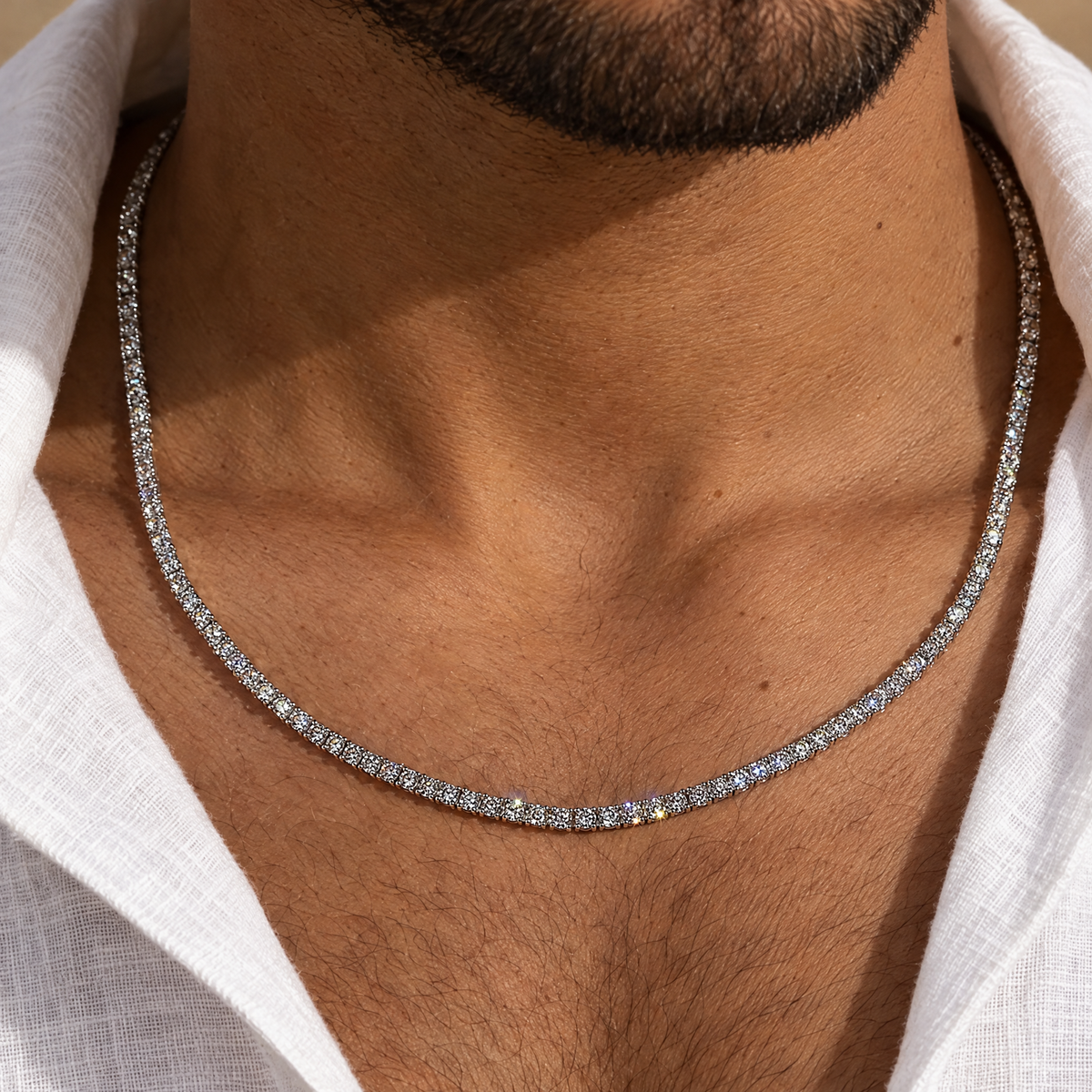 Men's 3MM Moissanite Tennis Necklace in silver worn by an Arab male model