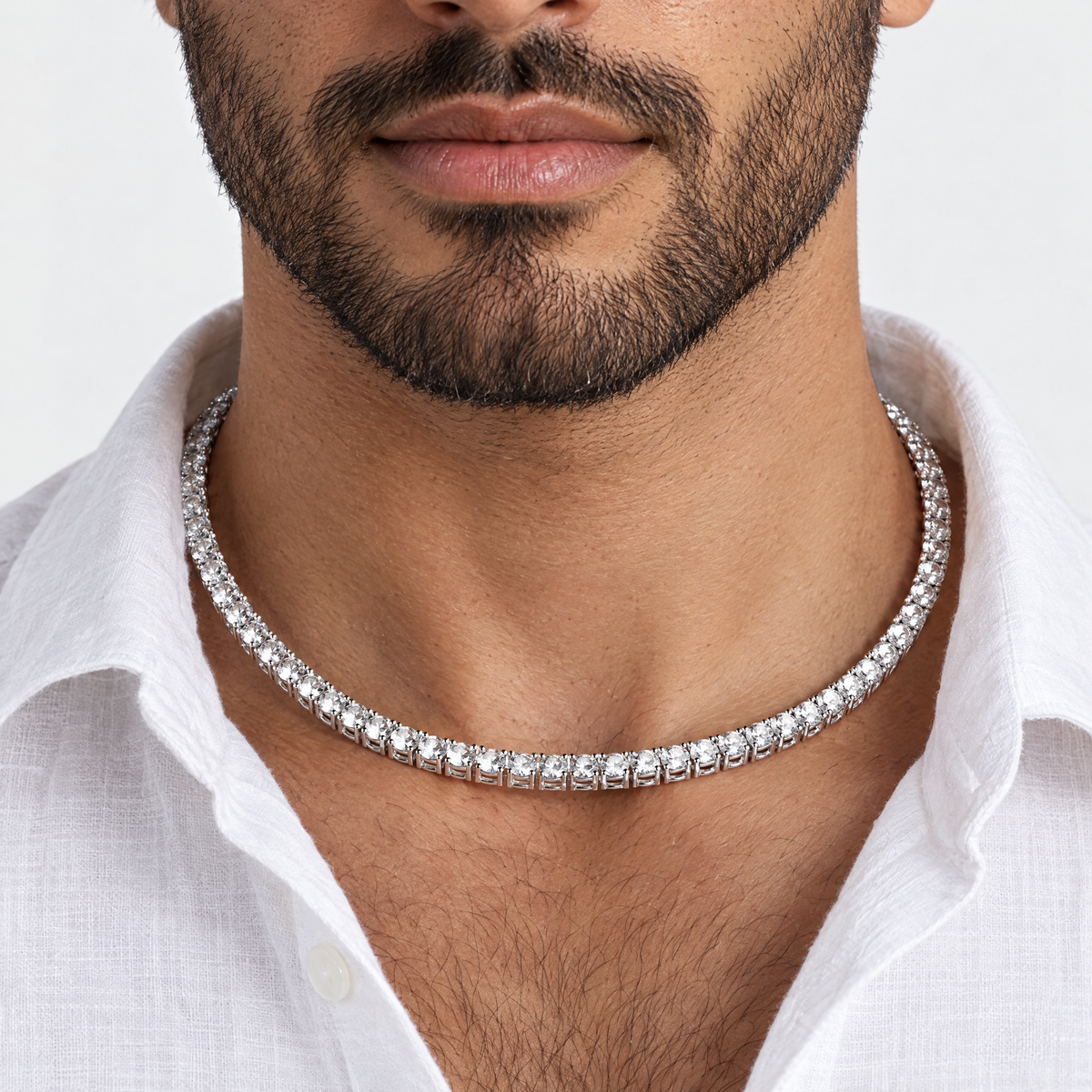 Men's 5MM Moissanite Tennis Necklace in silver worn by an Arab male model